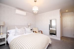 Bedroom One- click for photo gallery